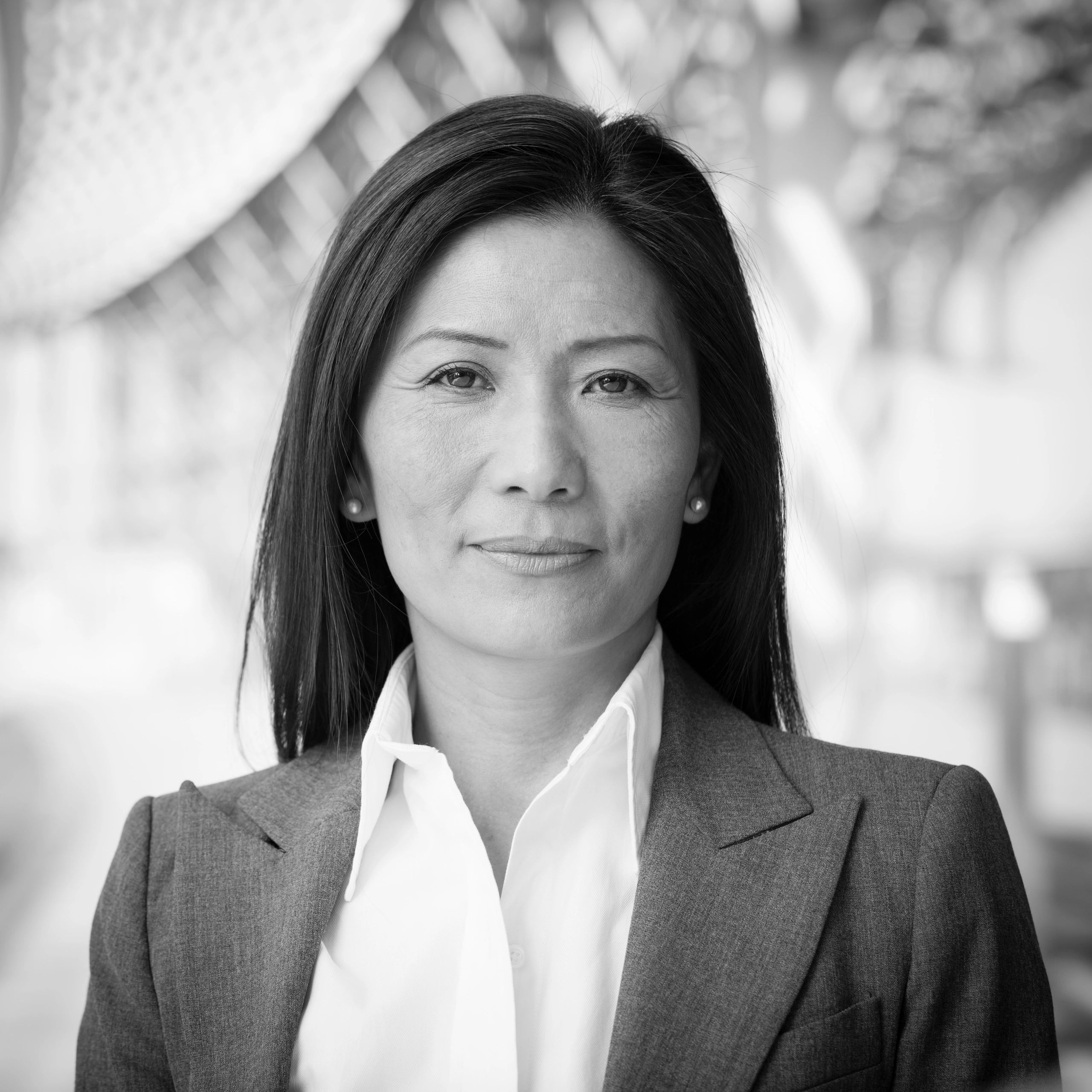 Professional headshot of a businesswoman, representing a client testimonial