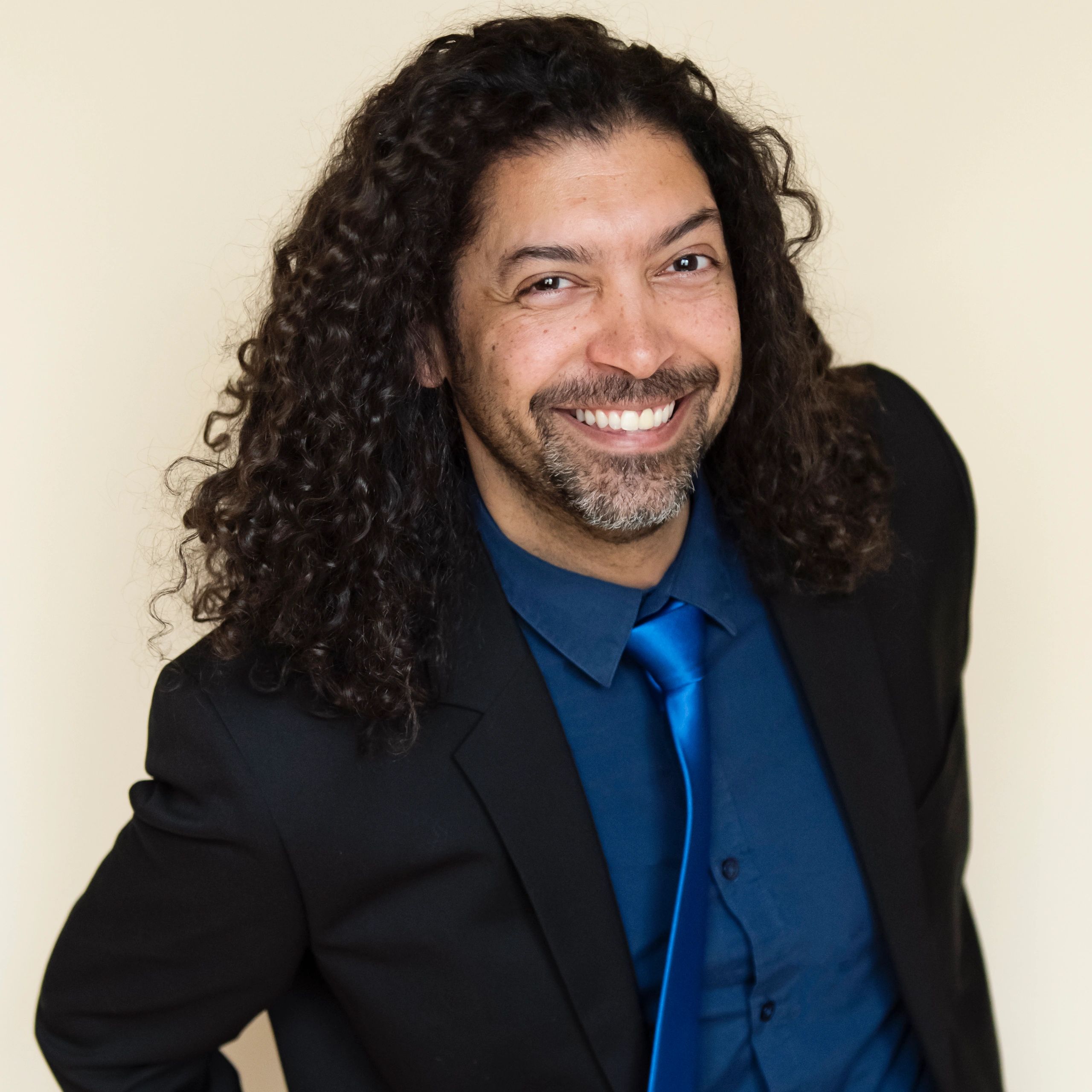Professional headshot of a business professional, representing a client testimonial