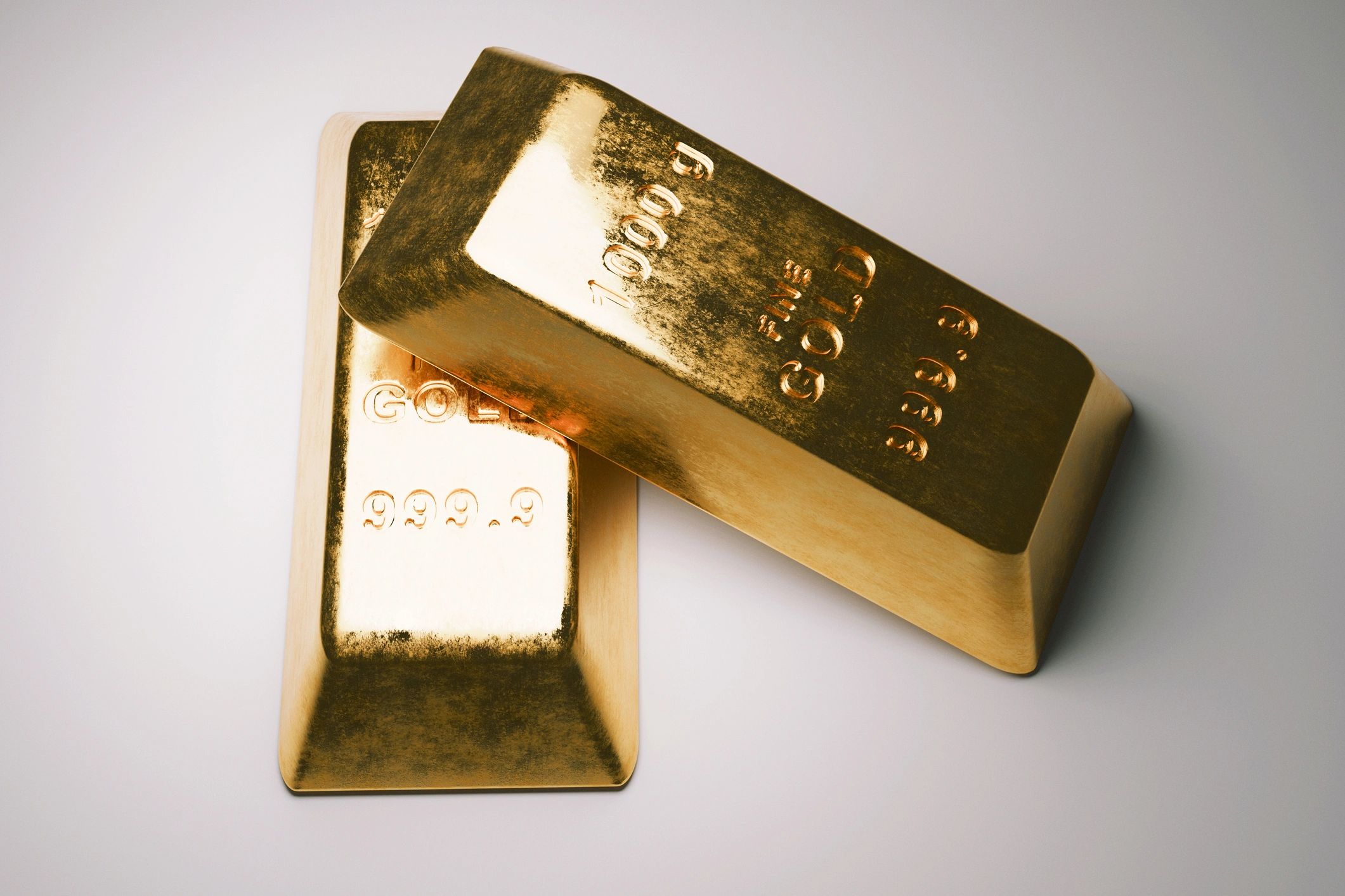 Close-up of fine gold bullion bars, representing verified precious metals supply