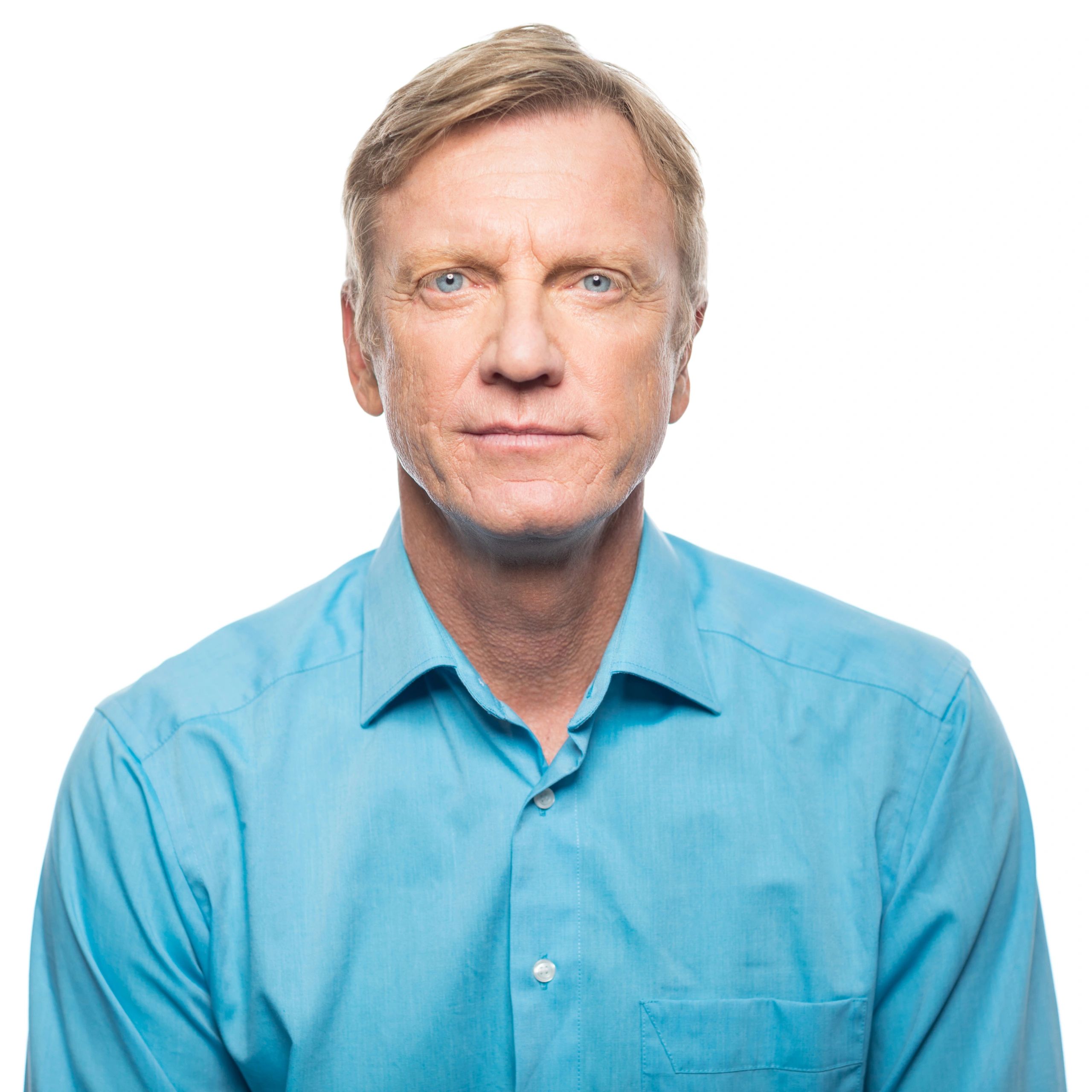 Professional headshot of a business man, representing a client testimonial